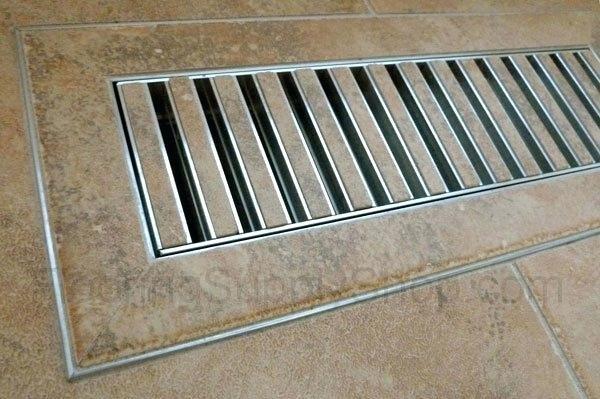 Flush vent installed with floor tile