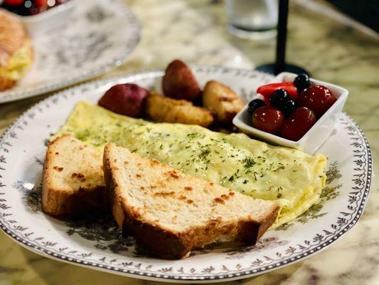 Omelette with potatoes and spinach