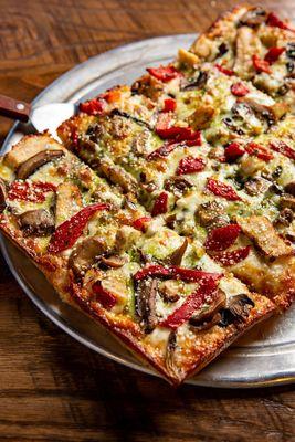 The Chicken Pesto - a delicious pesto base, premium cheese blend, roasted red peppers and mushrooms will make your tastebuds happy!