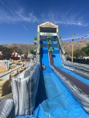 Bounce house slide the jump part is underneath the slide