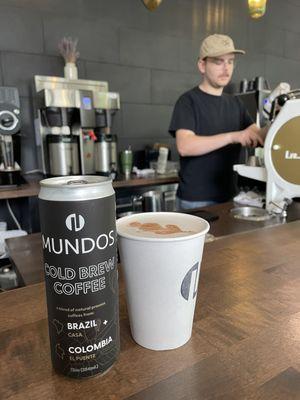 Nick is getting a vanilla latte ready for me at Mundos on Front Street in Traverse City.