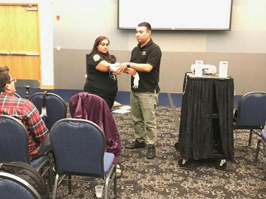 Cal State LA students training Severe bleeding bandage training.