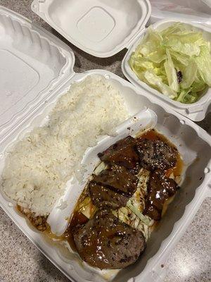 Beef teriyaki with a side salad