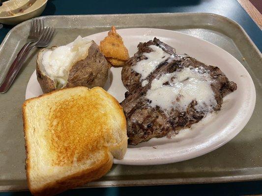 18oz T-bone steak medium rare with extra butter, shrimp, potato and toast. Delicious.