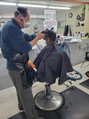 My little boy getting his haircut