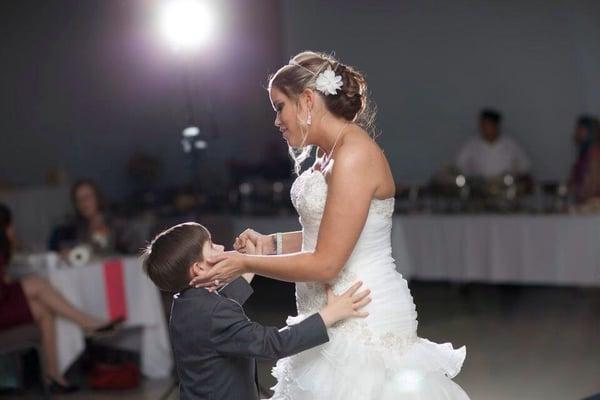 Bride and son dance.