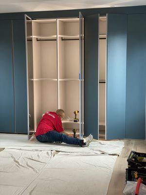 Custom closets being installed.