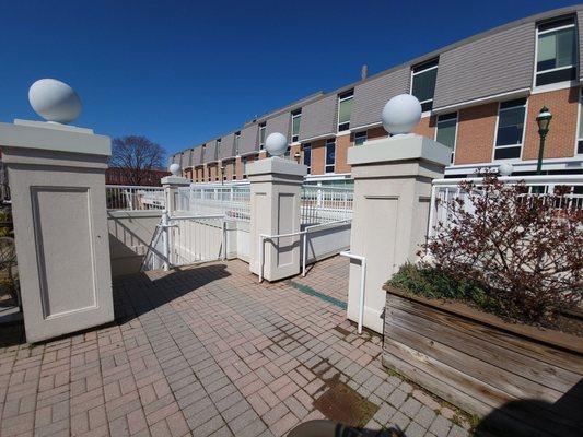 Straight forward leads to exterior stairway. Right side leads to another small terrace.