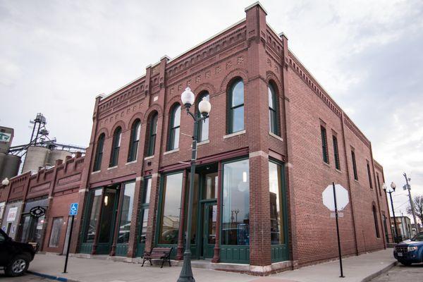 Outside the historic Bricker-Price Block building on Chestnut Ave. in Earlham.