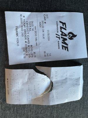 Receipt for Grilled Chicken Salad. $10.25, but charged $10.66 for using credit...