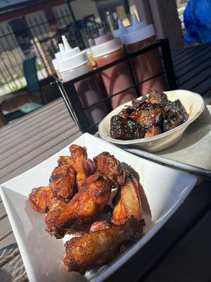 Smoked chicken wings and burnt ends with slew of handmade sauces