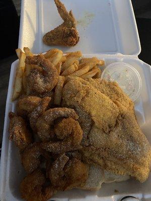 Catfish and shrimp and a chicken wing in the back