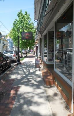 The store front and sign on a sunny spring morning. 2016