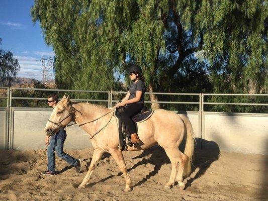 Rachael learning to ride.