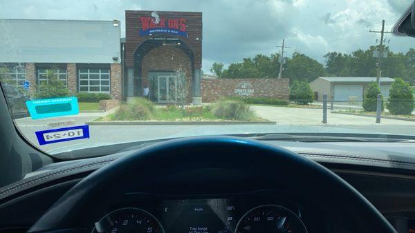 Take out has a separate entrance on the side, but no seats/bench to wait after you place your order