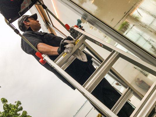 On the job window cleaning for a sales office in downtown Miami by Miami Window Washers.