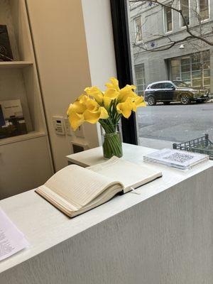 Desk with yellow canna lilies