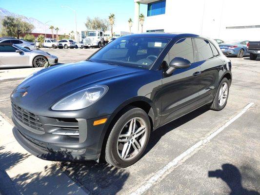 Before on a storm damage Porsche Macan