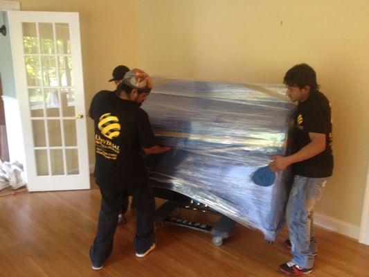 Universal Movers moving my old piano!