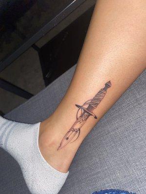 Dagger leg tattoo, super fresh only 8 hours old.