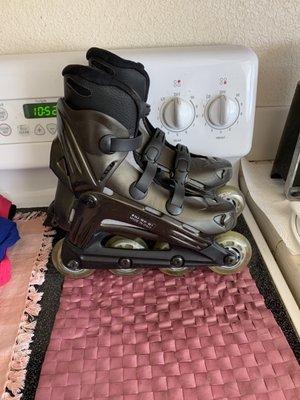 One pair of VIABLADE PARKWAY ROLLERBLADES. Black & Gold Accent.