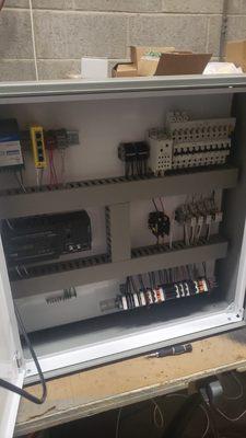 Weatherproof control box with PLC and HMI touch screen