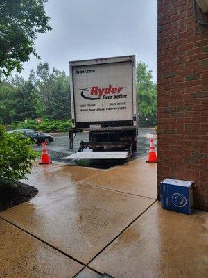 Delivery truck, had to get smaller truck to access the property. Raining when David arrived