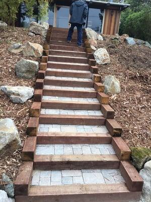 Paver and wood steps, boulder, mulch yard installation.