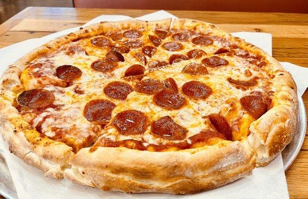 Pepperoni Pizza. Thick crust and skimpy pepperoni.