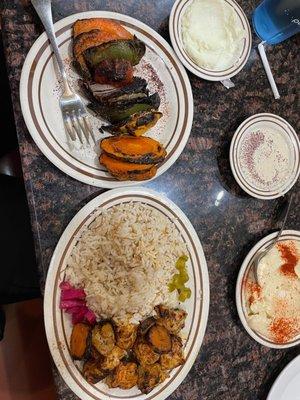 Roasted veggies, chicken kabob plate, hummus