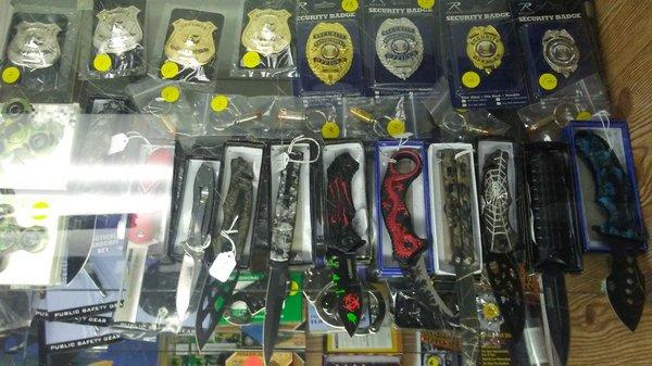 Assortment of knives and badges