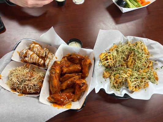 Honey Buffalo, spicy garlic parm, spicy ranch. Truffle fries