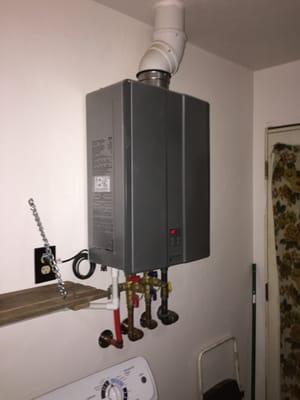 My tankless water heater after removing the too small for my family 30 Gallon tank from the kitchen closet and installed in our laundry/bath