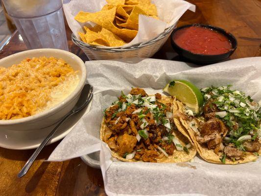 Mexican rice with queso and tacos