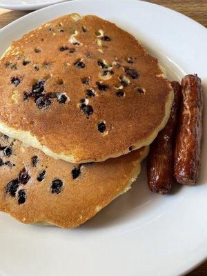 Blueberry pancakes and link sausage.