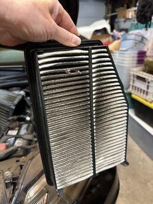 Air filter after being checked at Jiffy Lube.