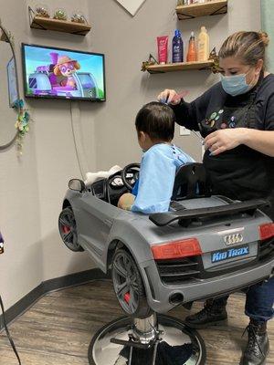 Paw Patrol, lollipop and a cool car seat = happy toddler