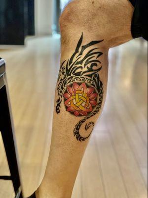 Celtic Knot/Lotus Flower surrounded by a Celtic Dragon.