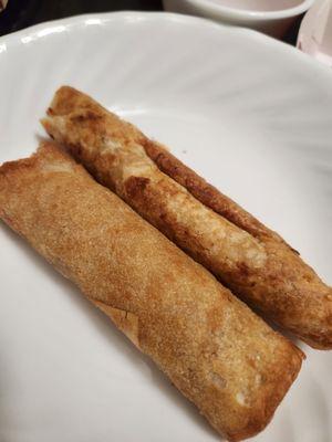 Eggroll and chicken teriyaki taquito.