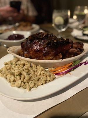 Schweinshaxe (pork shank) served with spatzle