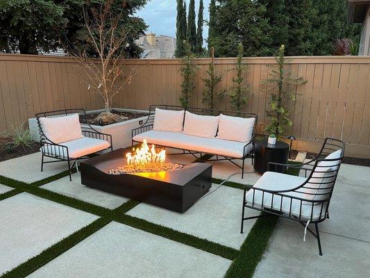 Modern Firepit area from our local project Crescent. This showcases a clean outdoor space with a portable firepit, and seating options.