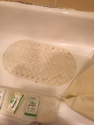 Tub was dirty with black stuff in the mat