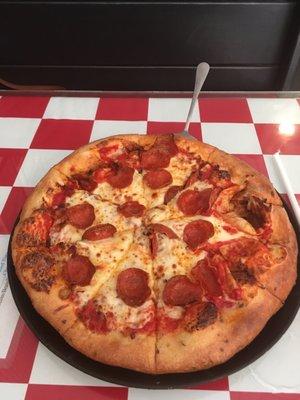 Medium pepperoni and bacon pizza