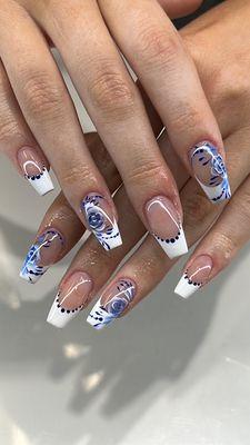 French tips with blue floral designs