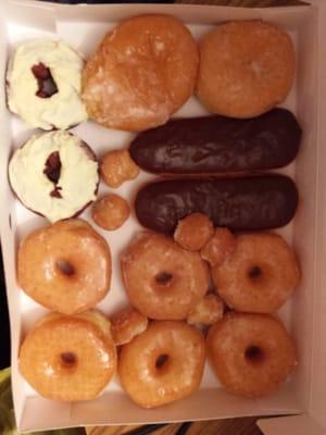 Half dozen glazed, two chocolate long johns, two red velvet, one raspberry filled, and one Bavarian filled.