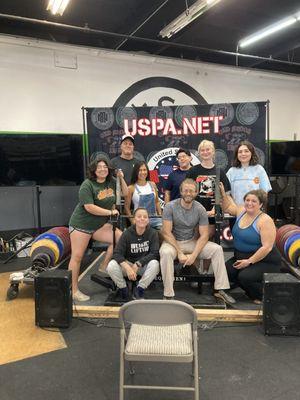 Our amazing volunteers setting up for a powerlifting meet!