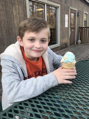 A young patron enjoying ice cream at Subway.