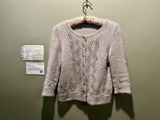 You are invited to touch this cuddly knitted sweater