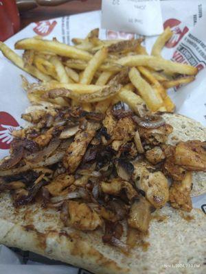 Teriyaki chicken with mushrooms and onions on multigain with fries.