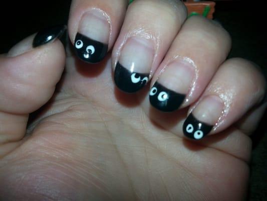 Googlie eyes nails for Halloween.